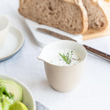 CREAM PORCELAIN MILKER